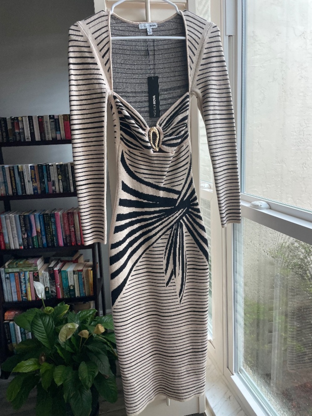 Fashion Nova Tan and black body con dress. size small